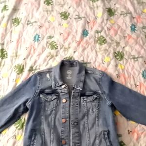 A ripped jean jacket